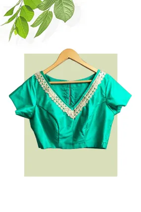 Green blouse with embroidered neck